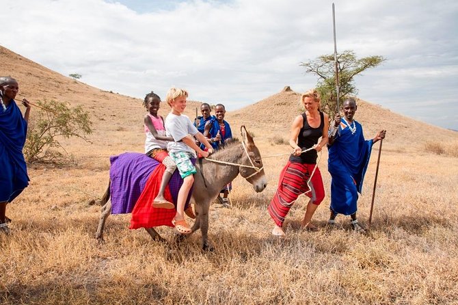 1 Day Olpopongi Real Maasai Cultural adventurous Trip | BURIGI CHATO SAFARIS LTD - Walking through the village and Maasai boma