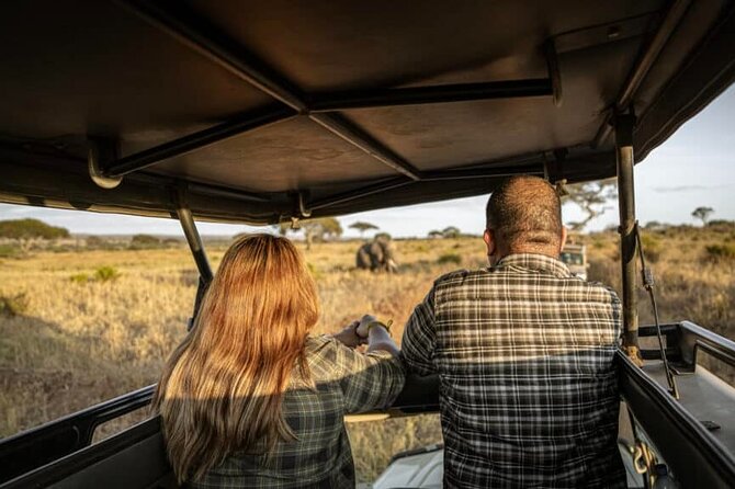 2 Days Camping Group Joining Tarangire Ngorongoro Crater Safari - Tarangire National Park: elephants beneath baobabs