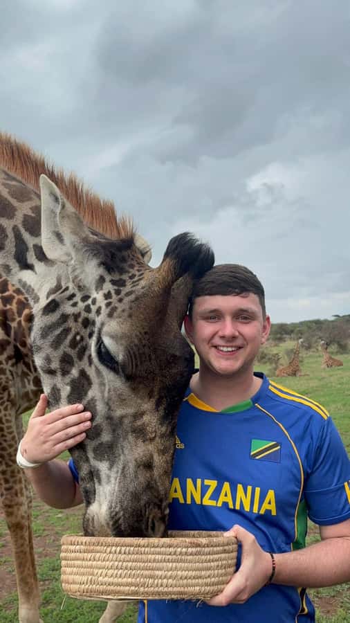 Arusha: Day Trip to Serval Wildlife - Feed Giraffes & Lions - Picnic lunch with a view toward Maasai life