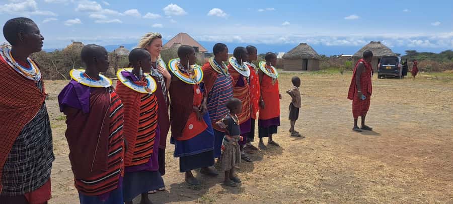 Arusha: Maasai Village Tour - Wearing Maasai clothing and joining the jumping dance