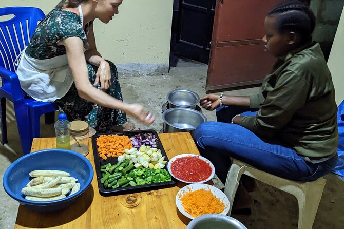 Arusha: Traditional Tanzania Cooking Class & Food Market Tour - Sitting down to eat what you made