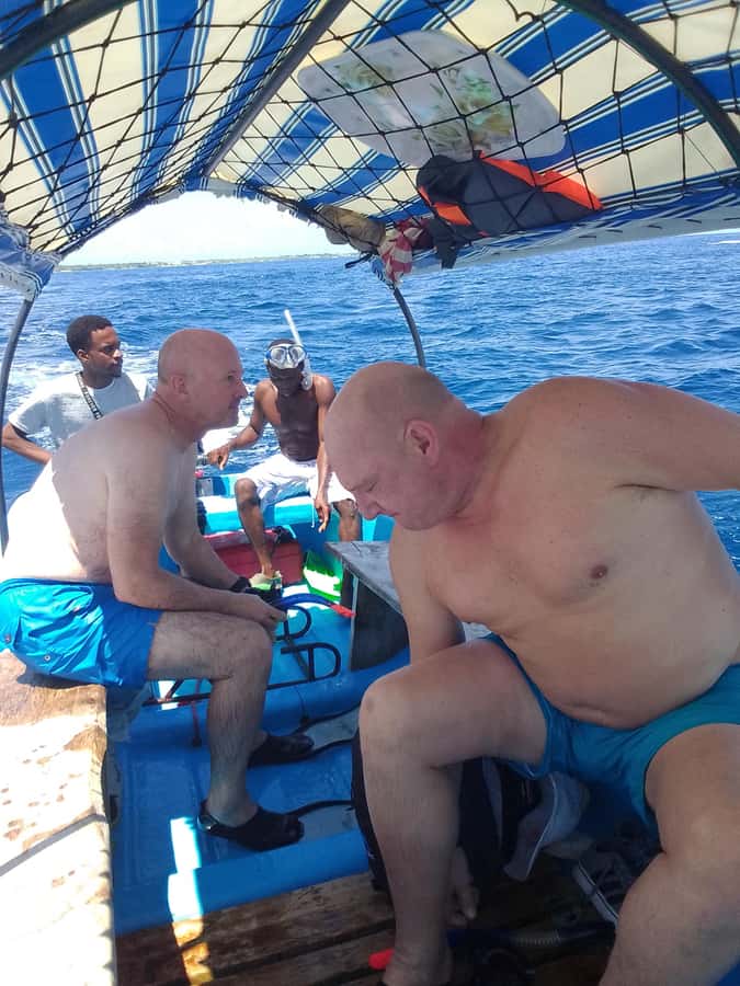 Dolphins & Snorkeling Zanzibar: Mnemba Island Tour - A quiet half-hour on the boat