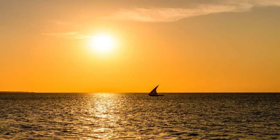 From Nungwi: Guided Sunset Dhow Cruise - A traditional dhow, with a simple setup