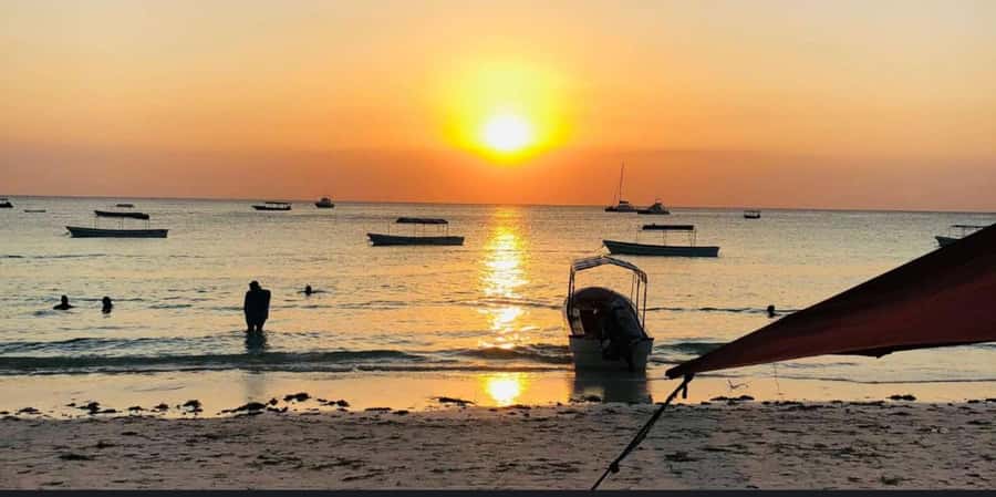 FROM NUNGWI; SUNSET DHOW CRUISE EXPERIENCE - Golden light, open water, and a slower pace