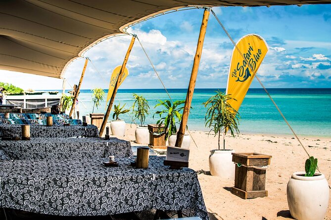 Full-Day Blue Lagoon and Sandbank Boat Tour from Zanzibar ( Safari blue) - Snorkeling over coral and fish