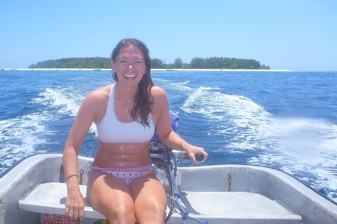 Half Day Zanzibar Mnemba Atoll Marine Reserve Snorkeling Tour - Checking the snorkeling equipment