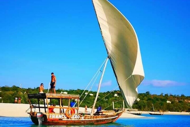 Half Day Zanzibar Mnemba Atoll Marine Reserve Snorkeling Tour - Water, fruit, and the missing lunch