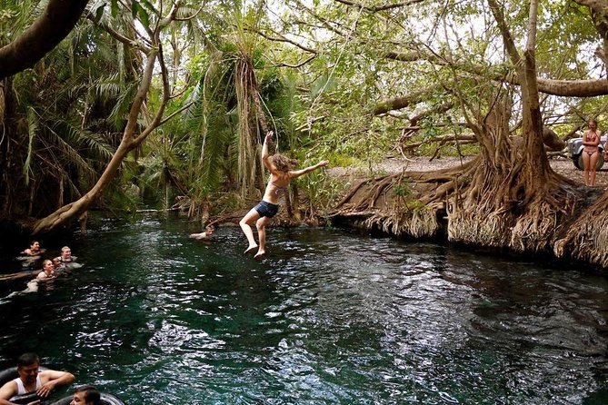 Kikuletwa hot spring and Arusha Cultural Heritage, Full Day Tour - Rope jumps and a lively poolside scene