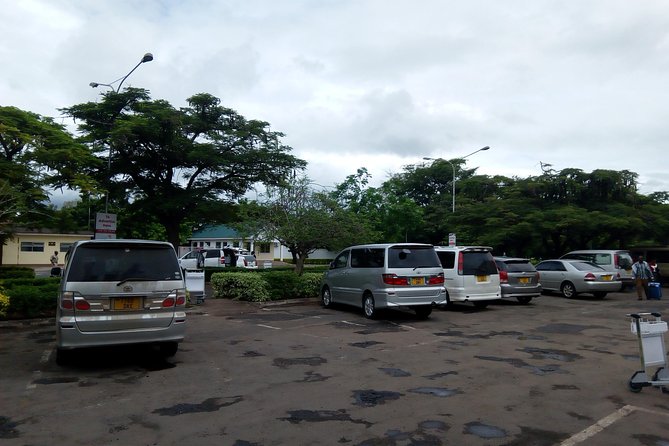 Kilimanjaro Airport taxi to/from Moshi town/Arusha town - The airport arrival: look for your name