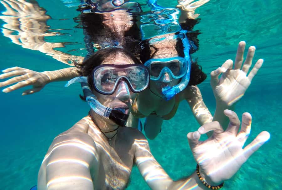 Matemwe: Mnemba Island Dolphin & Snorkeling Boat Trip - What the crew adds to the day