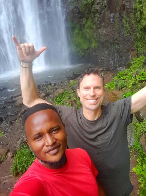 Moshi: Materuni Waterfalls and Coffee Tour - Walking through Materuni Village