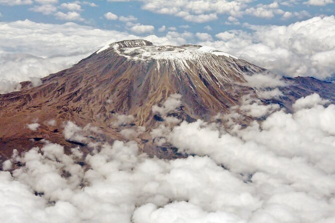 Private 6-Day Kilimanjaro Climbing via Machame route from Arusha - Day six: certificates, thanks and a muddy descent