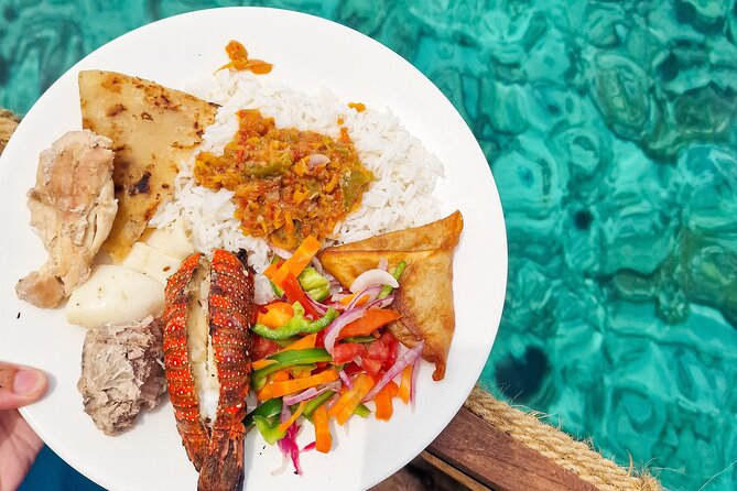 Private/Sharing: Snorkeling with Dolphins Sandbank in Mnemba - A seafood and chicken BBQ served onboard