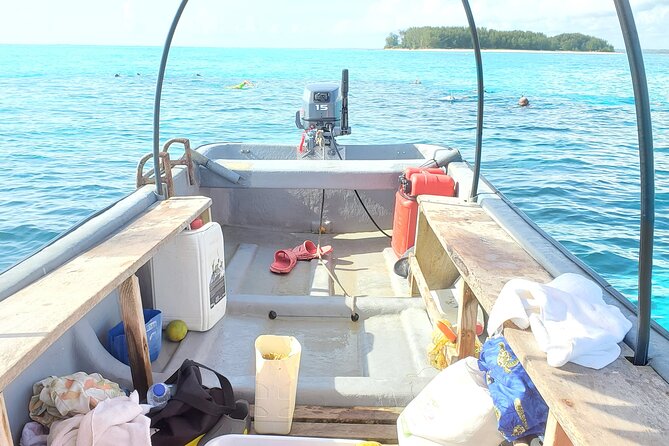 Private Tour to Mnemba Island with Lunch - Boarding the private boat near Mnemba