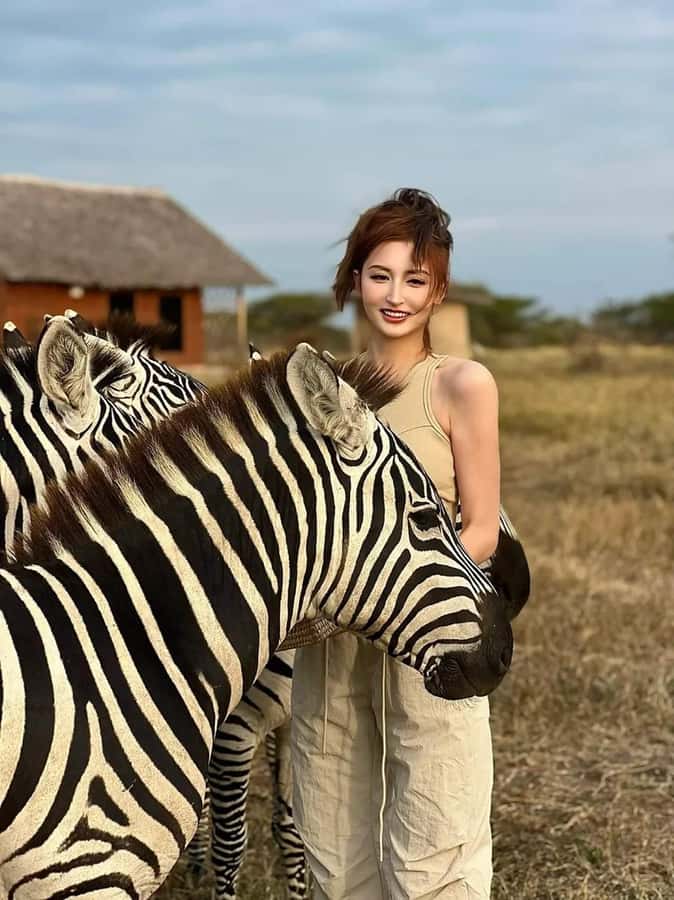 SERVAL WILDLIFE DAY - TOUR FROM ARUSHA, MOSHI OR ZANZIBAR. - Walking Among Servals, Giraffes, and Zebras