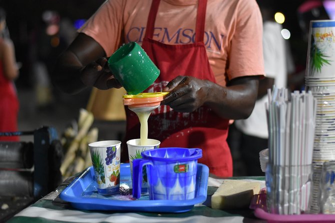 Stone Town Evening Walk Tour With Visit Food Markets - Africa House and the sunset drink
