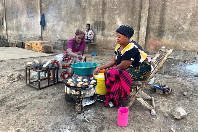 Street Food and Community Walking Tour - Walking into Sinoni with a local guide