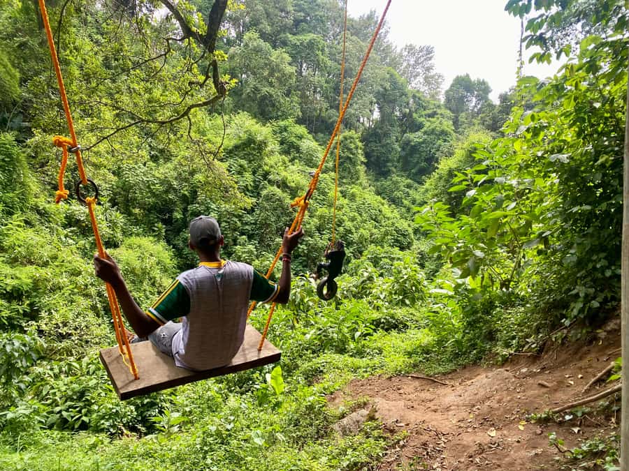 Tengeru Waterfalls Adventure & Lake Duluti Canoeing Escape - A swing above Tengeru and Mount Meru