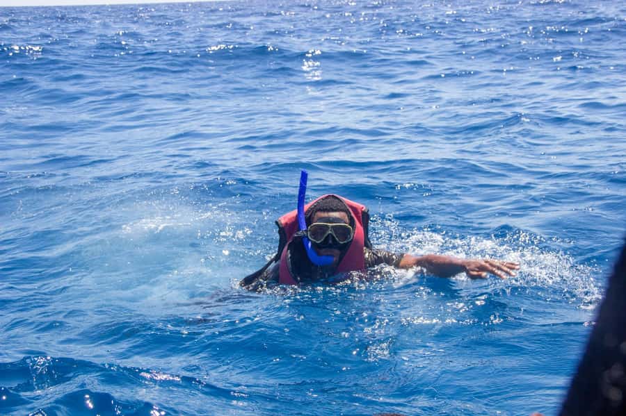 Zanzibar: Mnemba island Snorkeling & Boat Tour with Lunch - The morning pickup from your Zanzibar hotel