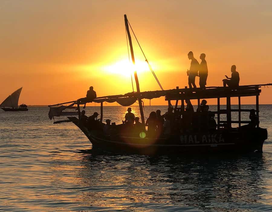 Zanzibar: Sunset Dhow Cruise - Swimming, Photos, and the Evening Light
